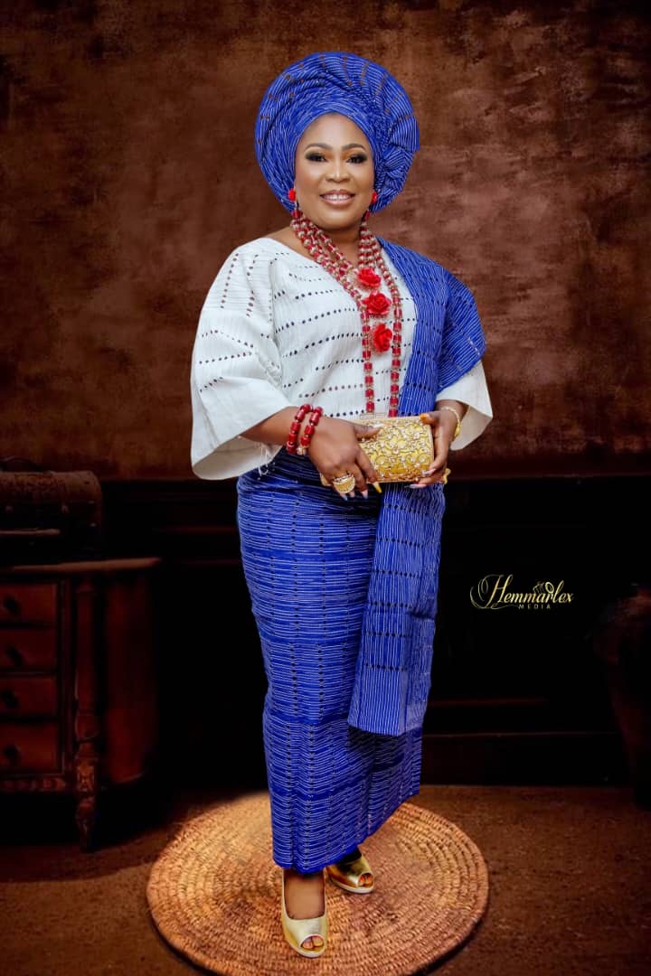 Folashade Ashabi Kasali in blue and white traditional attire