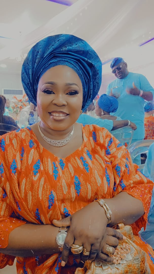 Folashade Ashabi Kasali in orange traditional attire
