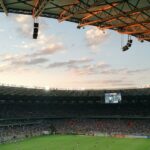 Floodlit football stadium illustrating Nigeria's AFCON qualifying defeat