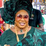 Iyalode Folashade Ashabi Kasali in green traditional attire