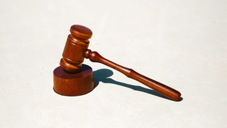 A wooden judge's gavel on a light surface, illustrating the US court ruling on Kalshi.