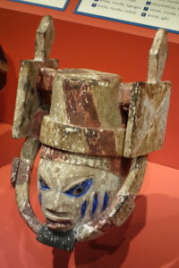 Archive photograph of a carved Yoruba Gelede mask displayed at Glenbow Museum, Calgary, in 2013
