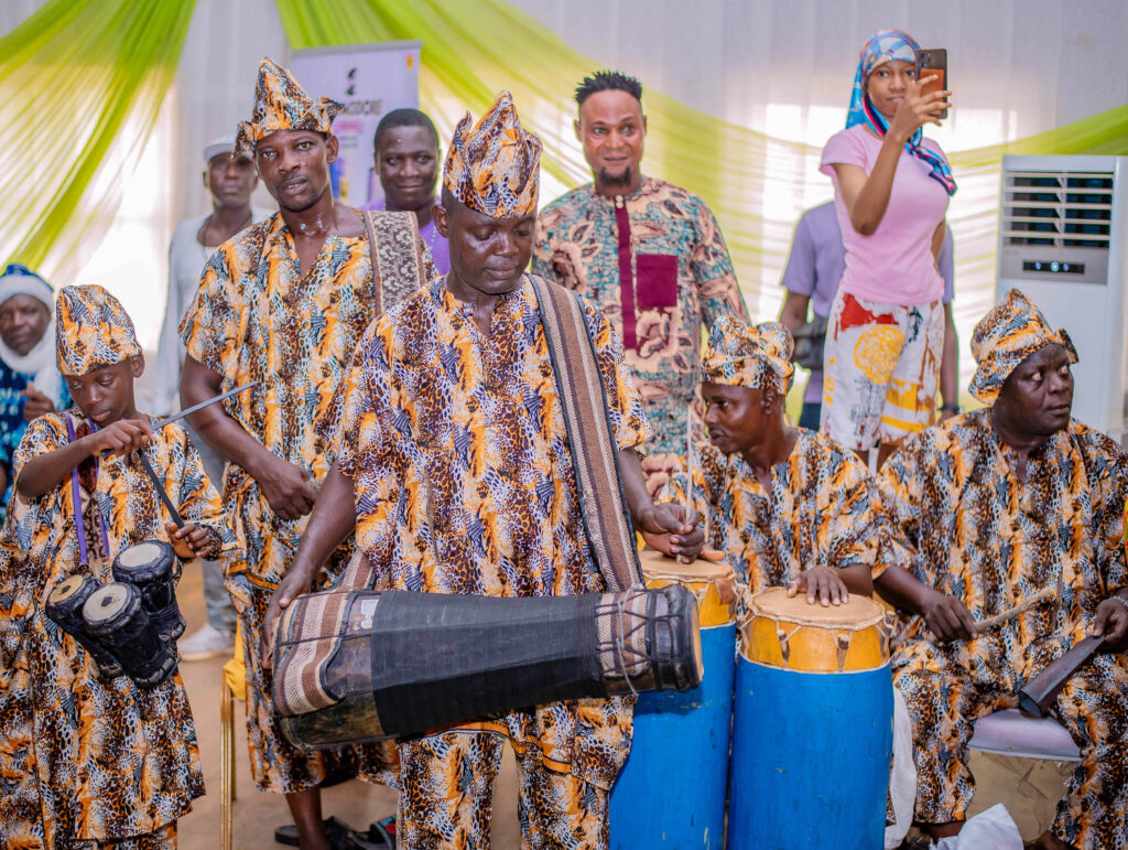 Archive photograph of musicians with a bàtá drum at an Ibadan cultural festival, 15 April 2026; not the Miami programme