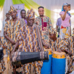 Archive photograph of musicians with a bàtá drum at an Ibadan cultural festival, 15 April 2026; not the Miami programme