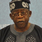 Bola Tinubu speaking at Chatham House in July 2011