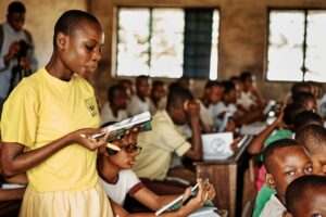 Students seated in a Nigerian classroom during an education charity visit