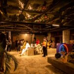 Visitors viewing African design objects at a Design Week Lagos exhibition