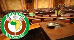 Illustrative composite of the ECOWAS emblem, scales of justice and a courtroom; not a photograph of the SERAP hearing