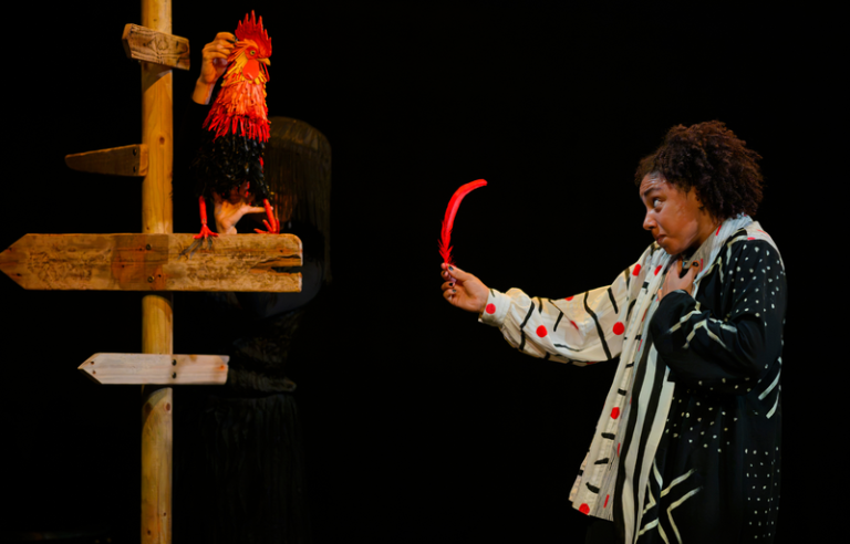 Performers in Eshu at the Crossroads, a Yoruba-inspired dance and puppetry production