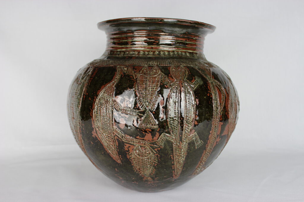 Hand-built ceramic pot by Ladi Kwali with incised decoration and transparent glaze, in York Art Gallery’s collection.