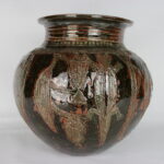 Hand-built ceramic pot by Ladi Kwali with incised decoration and transparent glaze, in York Art Gallery’s collection.