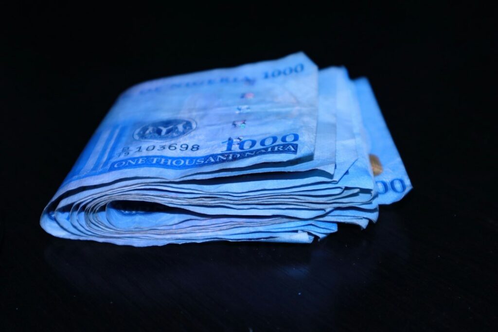 Stack of folded banknotes illustrating Nigeria’s rising debt interest costs
