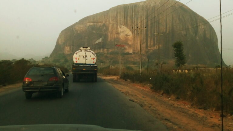 Traffic on the Kaduna-Abuja highway near Zuma Rock in December 2018, an archive location photograph.