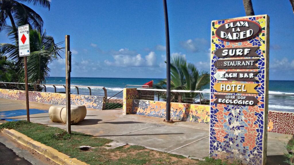 La Pared Beach promenade and mosaic sign in Luquillo, Puerto Rico, photographed in August 2020.
