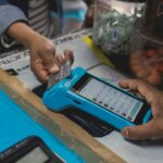 A card payment terminal processing a digital transaction in Africa