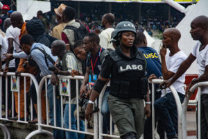 Nigeria Police officers at Tafawa Balewa Square, Lagos, in 2016; archival illustration of policing