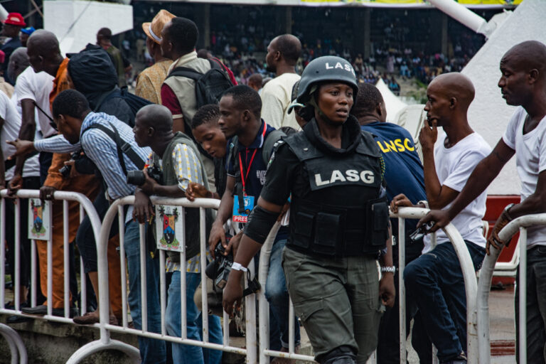 Nigeria Police officers at Tafawa Balewa Square, Lagos, in 2016; archival illustration of policing