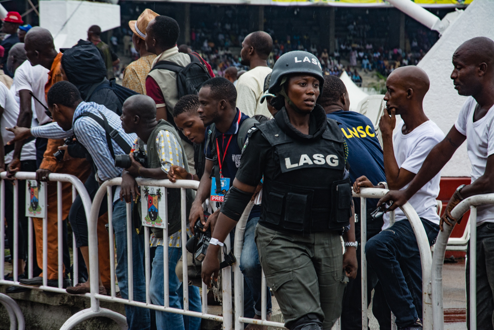 Nigeria Police officers at Tafawa Balewa Square, Lagos, in 2016; archival illustration of policing