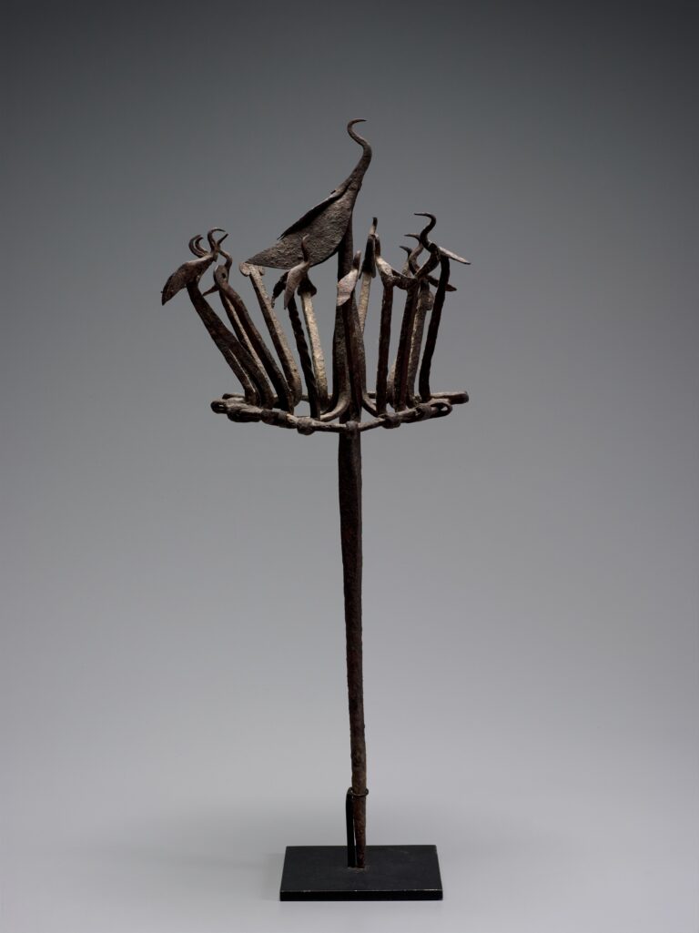 Iron Osanyin staff with a central bird and a surrounding ring of smaller birds, collected in Ibadan in 1979.