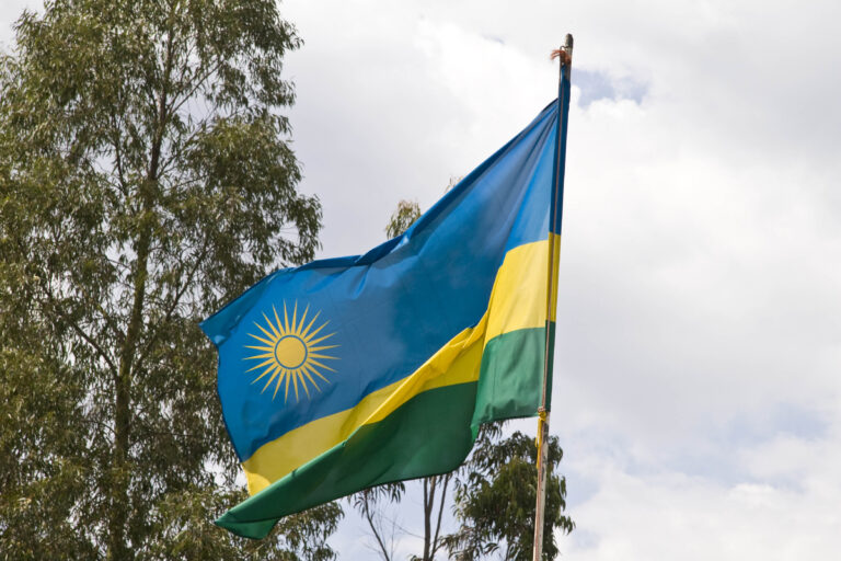 Rwandan flag flying outdoors, photographed on 24 February 2008. Archive illustration.