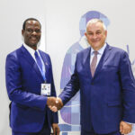 Taiwo Oyedele, left, with Jozef Síkela in Bangkok on 15 October 2026, archival photograph