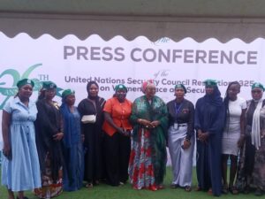 Women gather for a group photograph at the Abuja press conference marking the anniversary of UN Security Council Resolution 1325.
