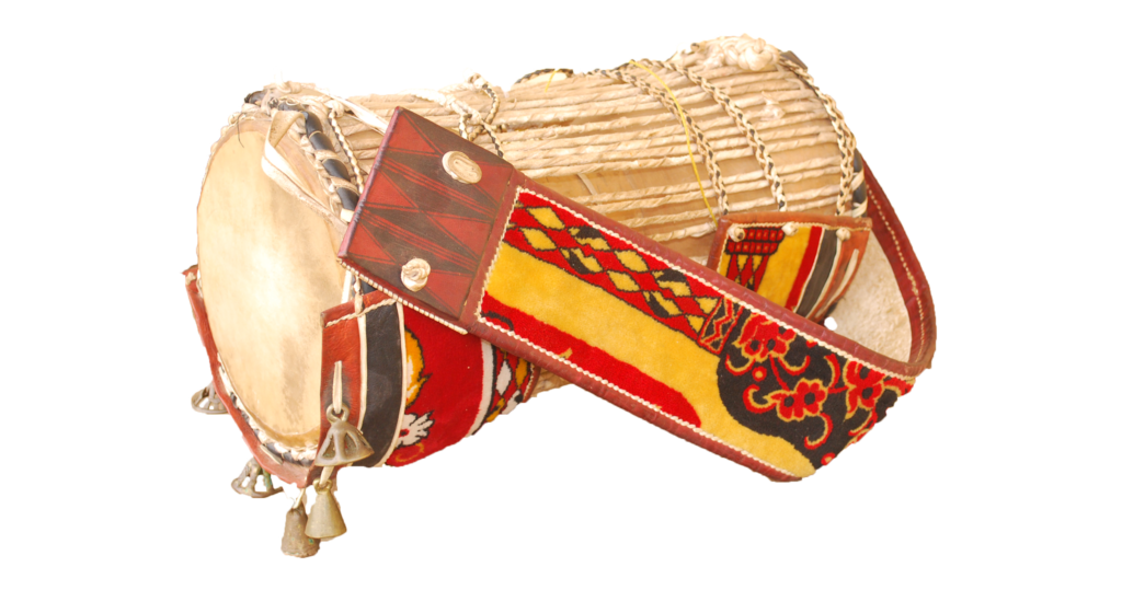 Yoruba talking drum with tension cords, decorated straps and bells, photographed in 2017; illustrative object, not from Aafin Ilu.