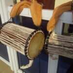 Yoruba talking drum with a smaller omele drum in western Nigeria